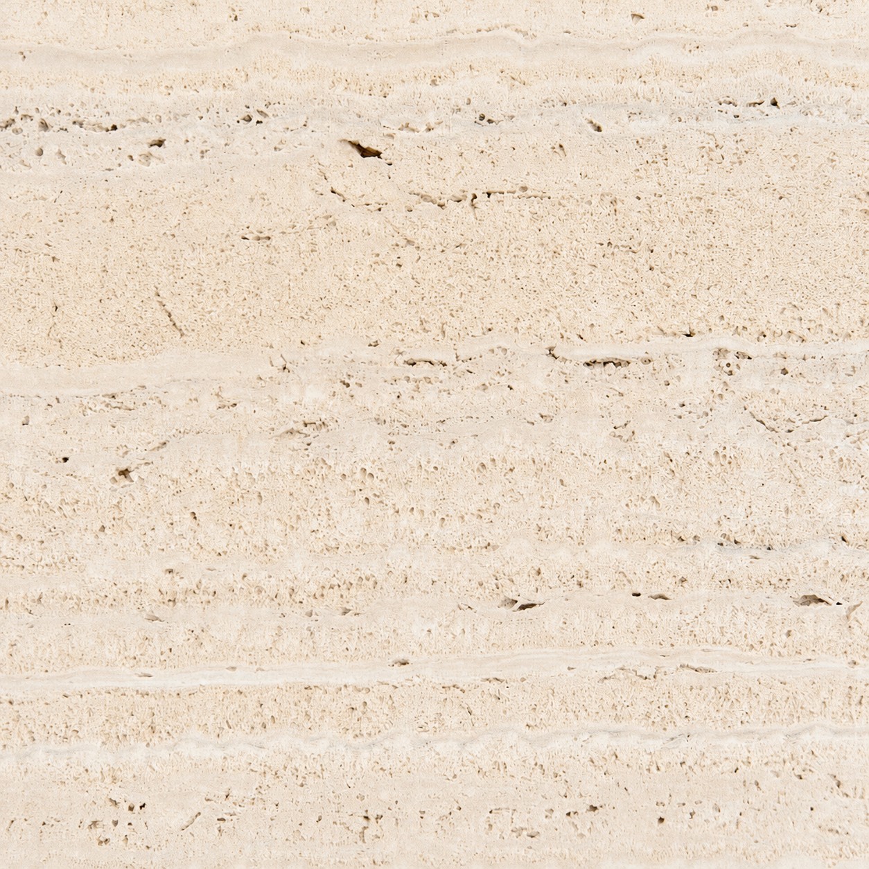 Textura em close do Travertino Romano Light, com poros e veios naturais